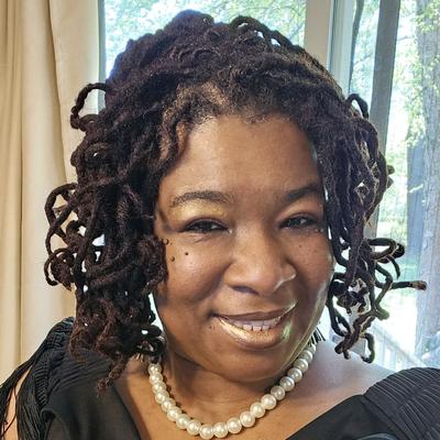 Portrait of creator deloresholmes